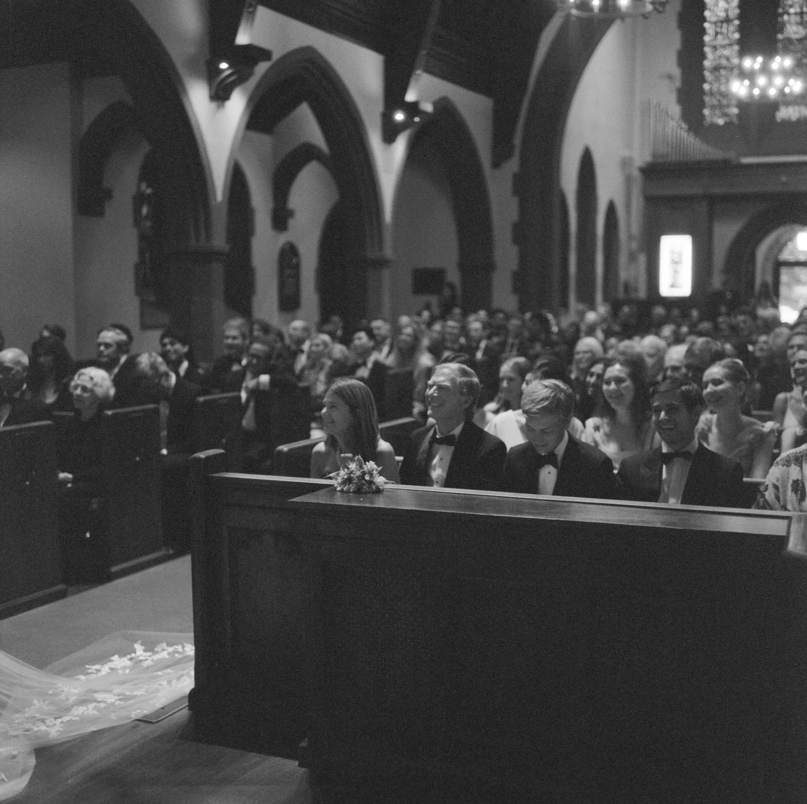st-lukes-east-hampton-wedding-guests-in-pews-bw-06.jpg