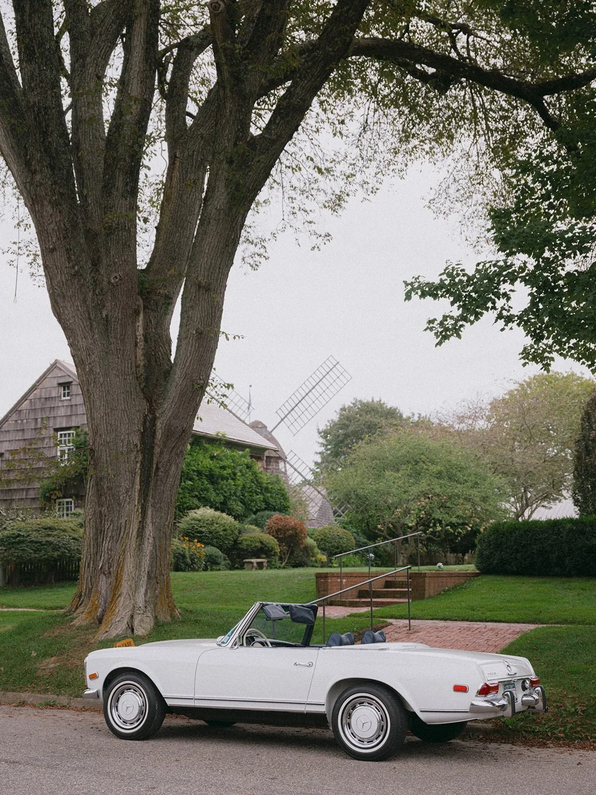 st-lukes-east-hampton-wedding-vintage-mercedes-under-tree-01.jpg