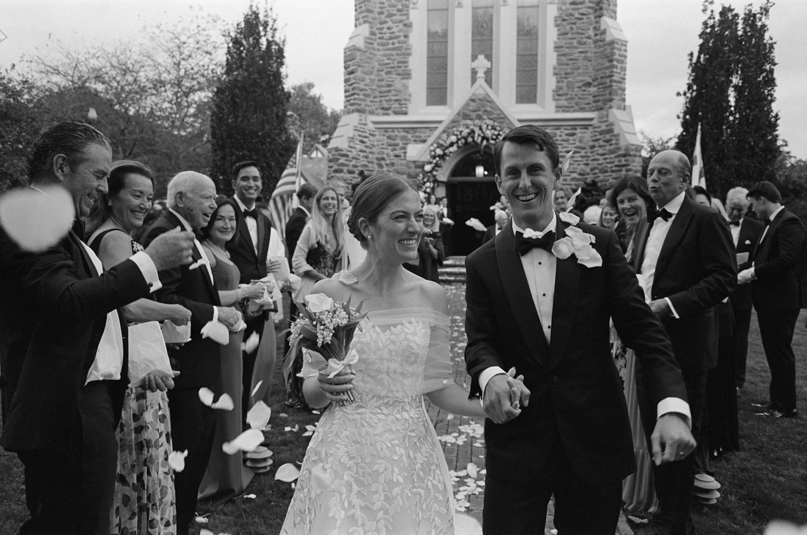 st-lukes-east-hampton-wedding-greeting-guests-bw-21.jpg