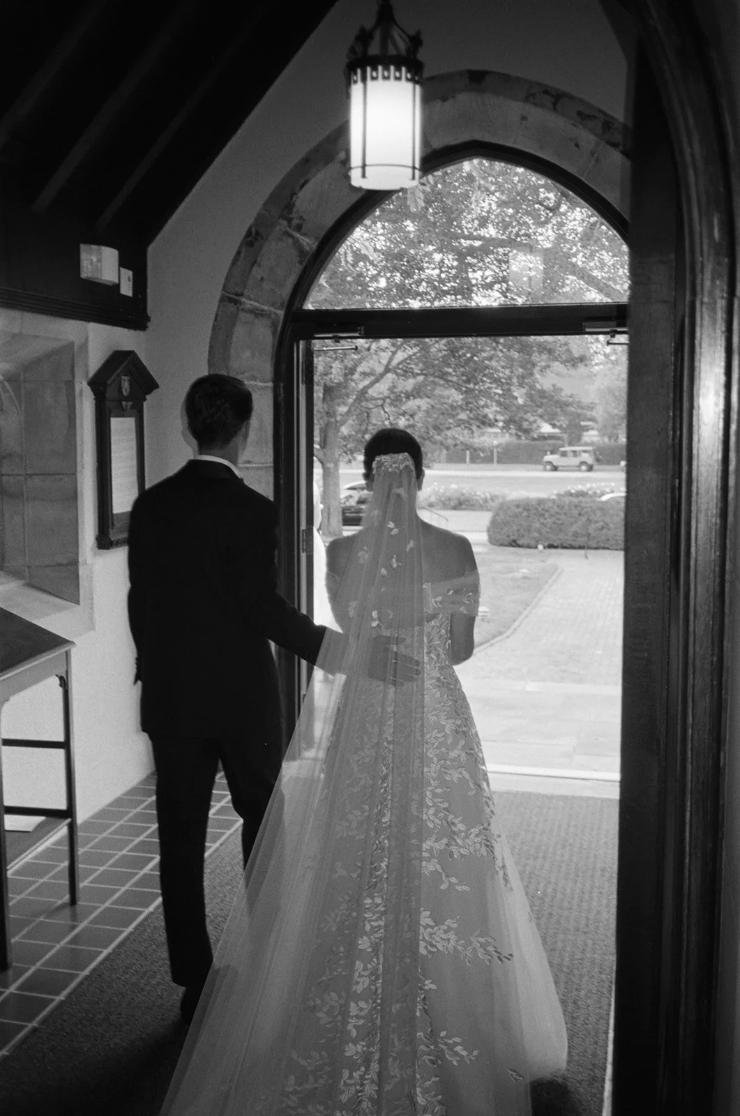 st-lukes-east-hampton-wedding-couple-in-doorway-bw-07.jpg