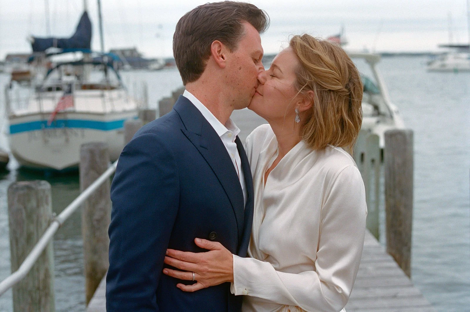 pridwin-hotel-wedding-kiss-on-dock-10.jpg