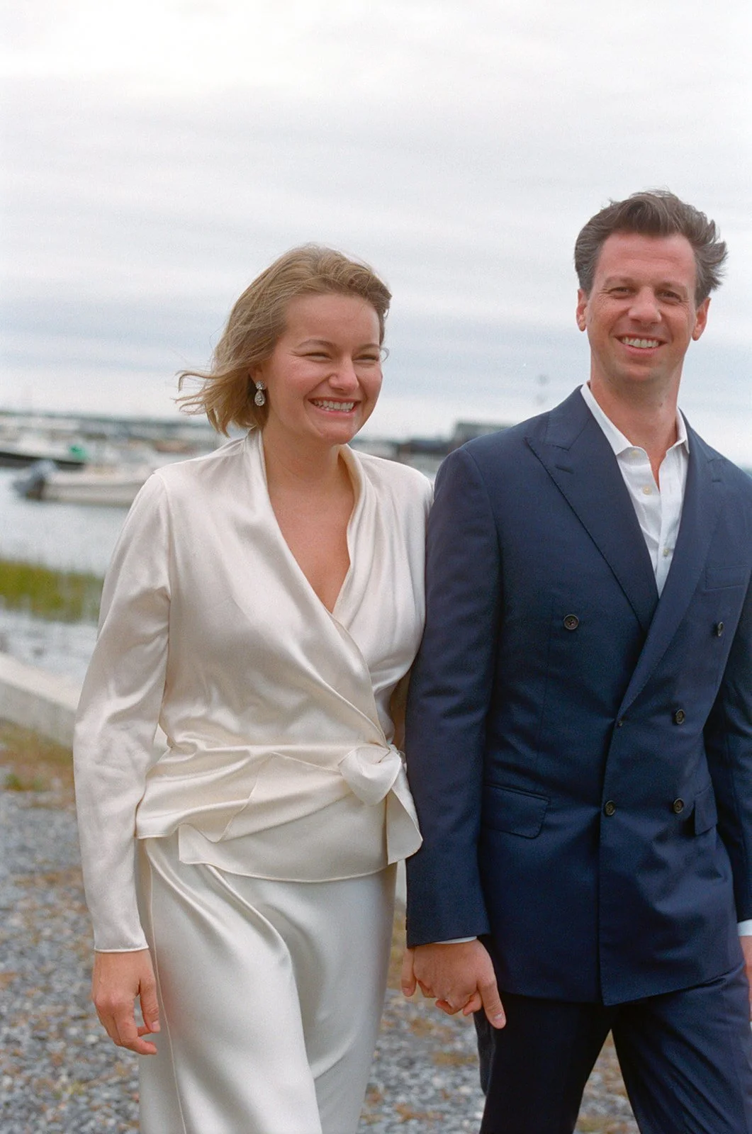 pridwin-hotel-wedding-couple-walking-harbor-06.jpg