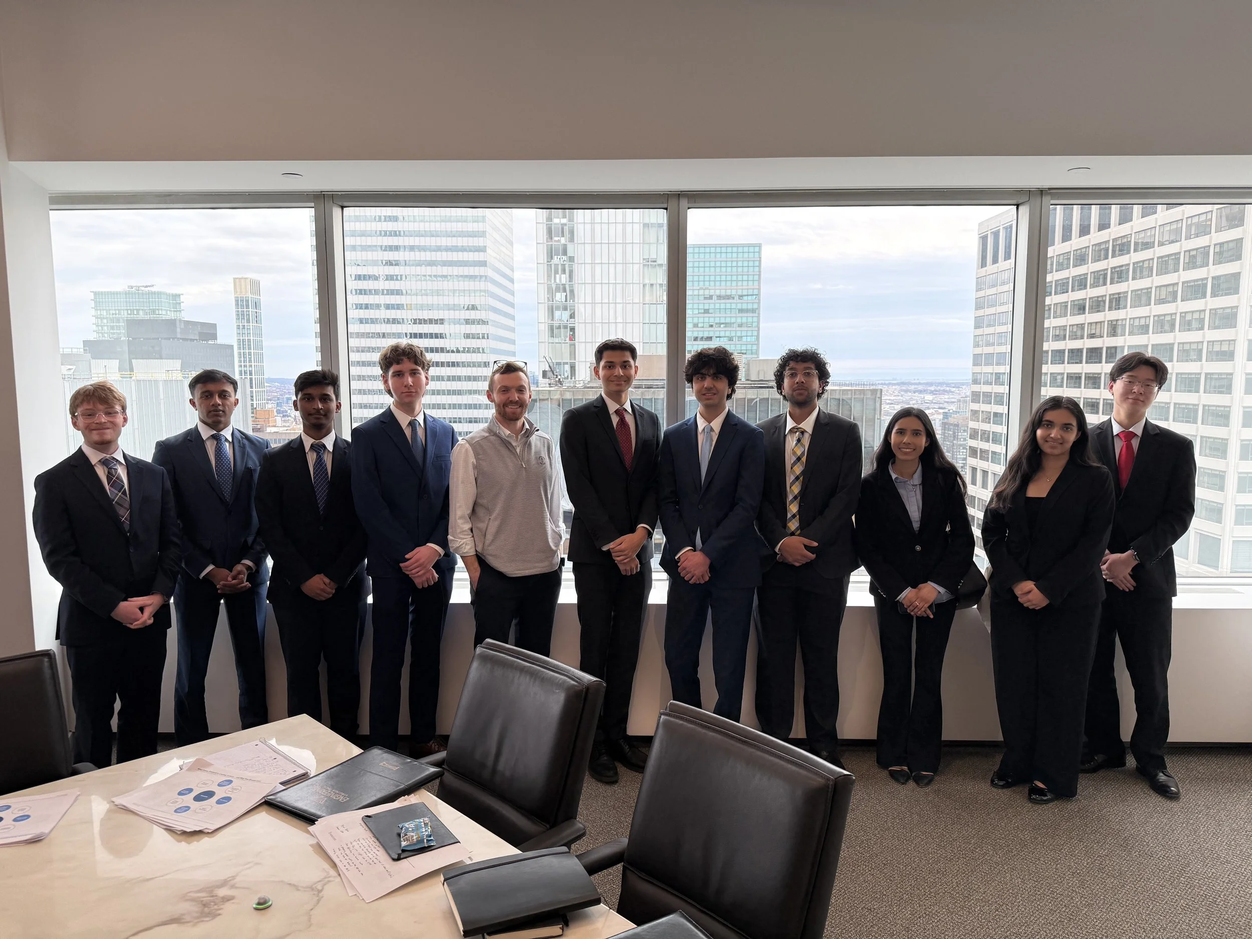 Group_at_NYC_High_Rise_Conference_Room_Skyline_View.jpg