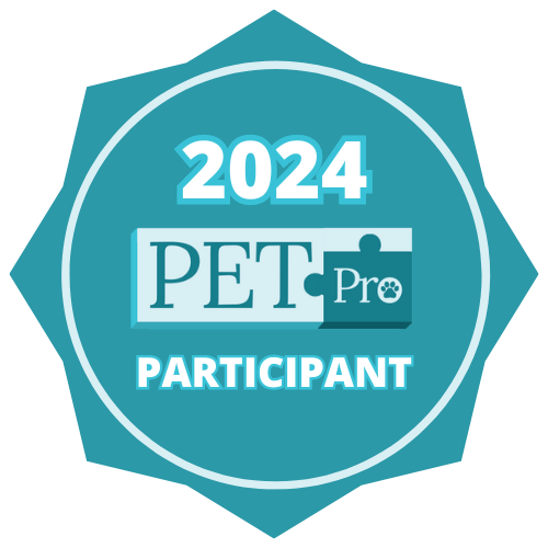Badge indicating 2024 PET Pro Participant with a circular design and a puzzle piece with a paw print.