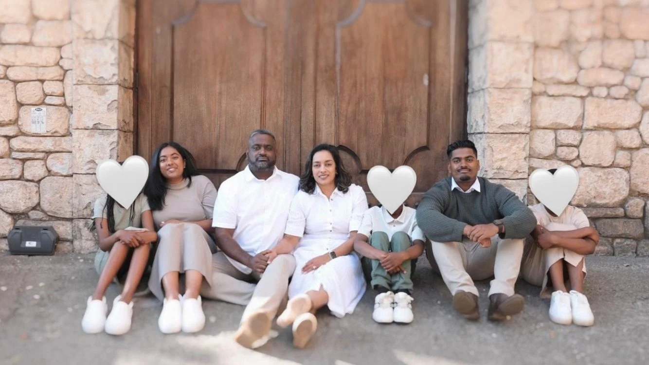 Foster family shares hugs