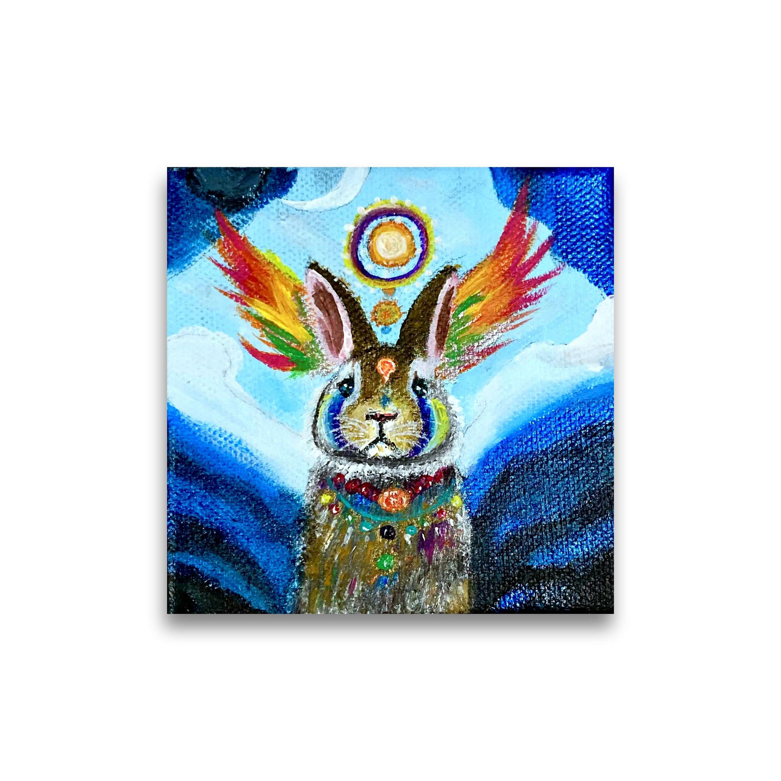 Whimsical painting of a rabbit with multicolored wings and patterns against a blue background.