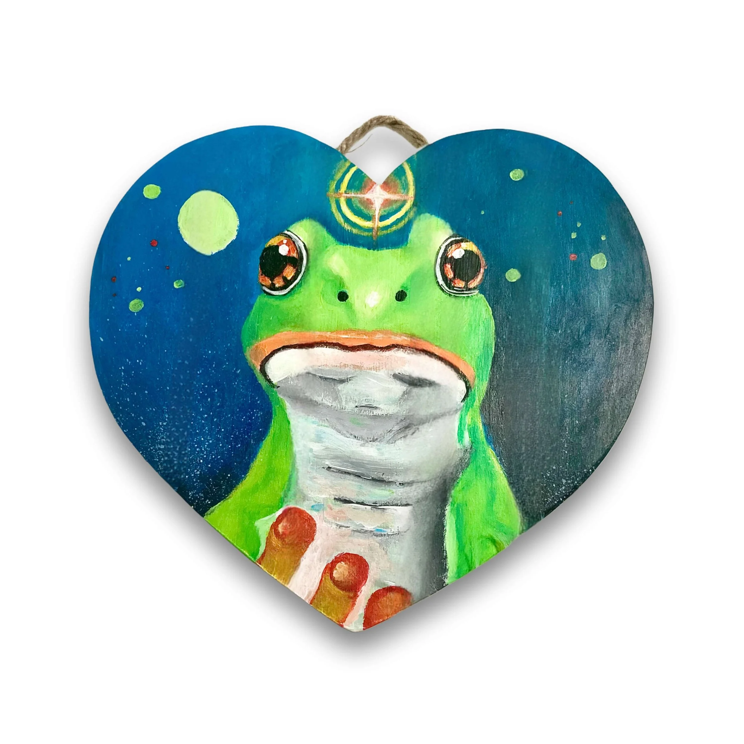 Heart-shaped painting of a frog under a starry sky with planets.