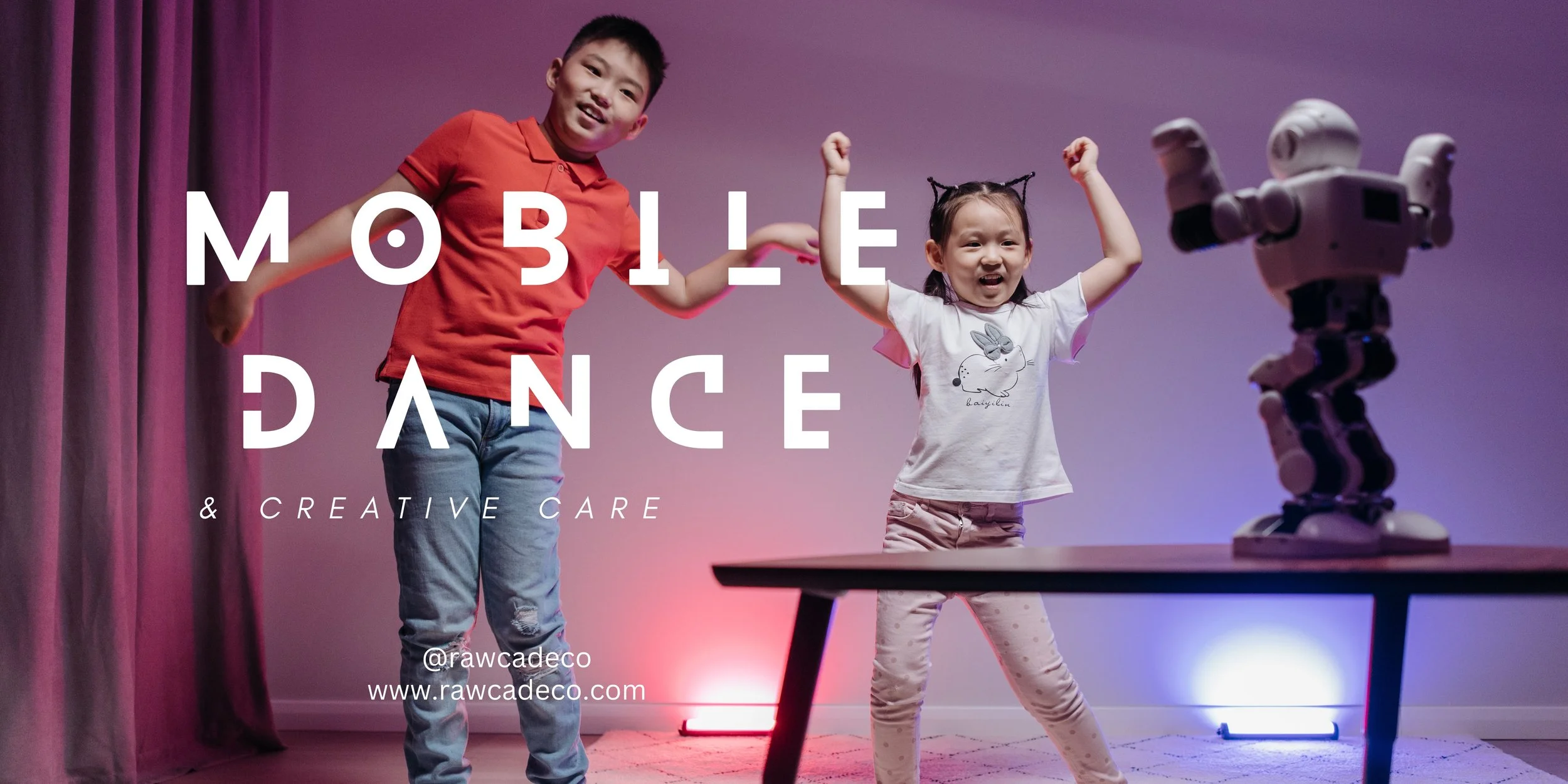Two children, a boy and a girl, dancing happily in front of a robot on a table, with colorful background lighting and purple curtains in the background.