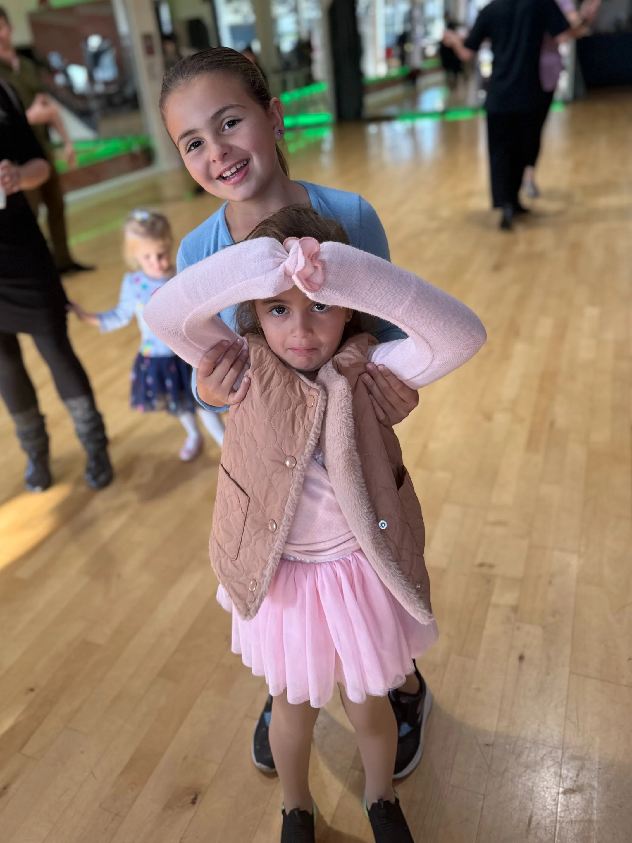 Stainless steel water bottle with black cap and red text "AWCADE" on the side.