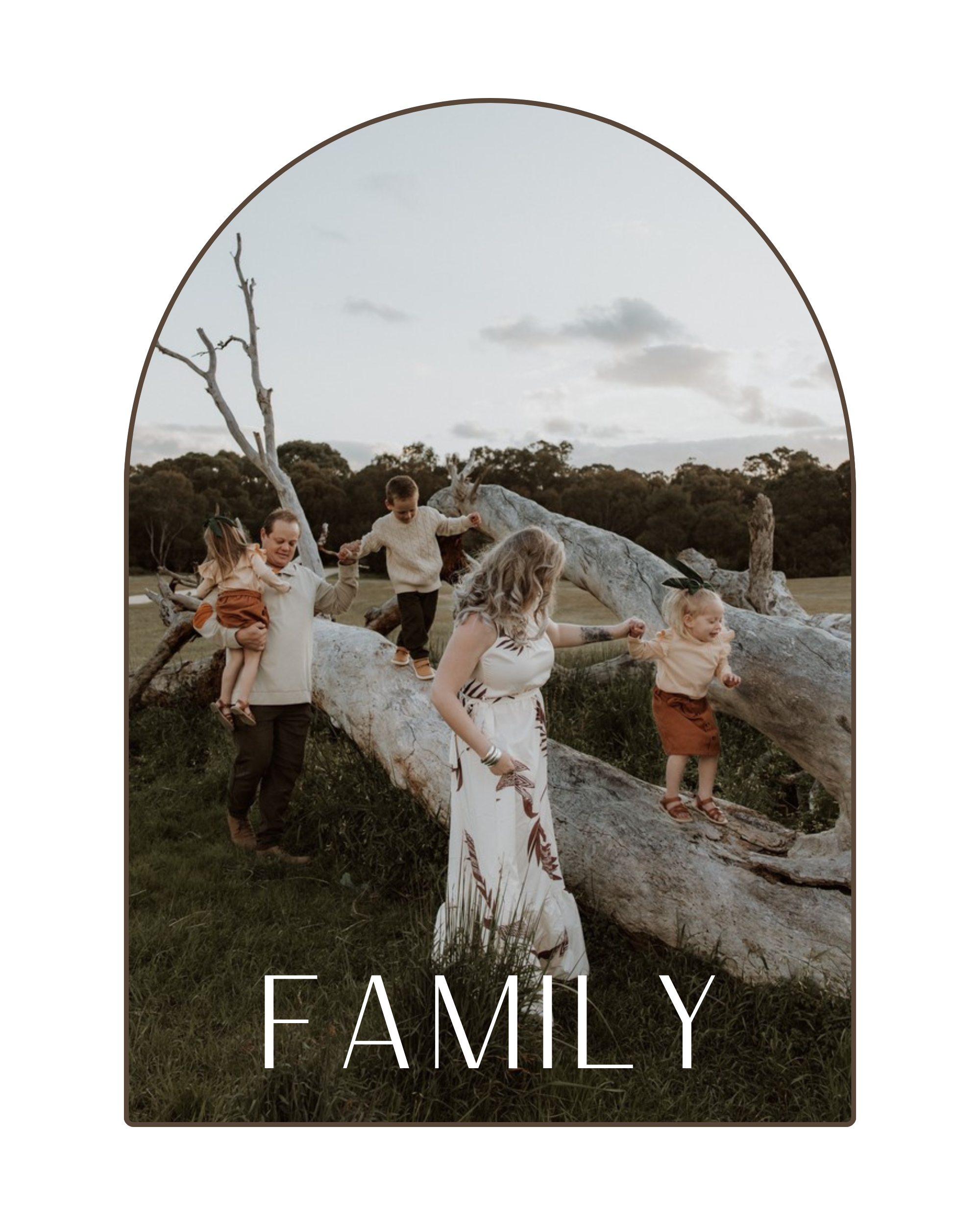 A family with two adults and three children playing on a fallen tree outdoors during sunset, with the word 'FAMILY' written at the bottom.