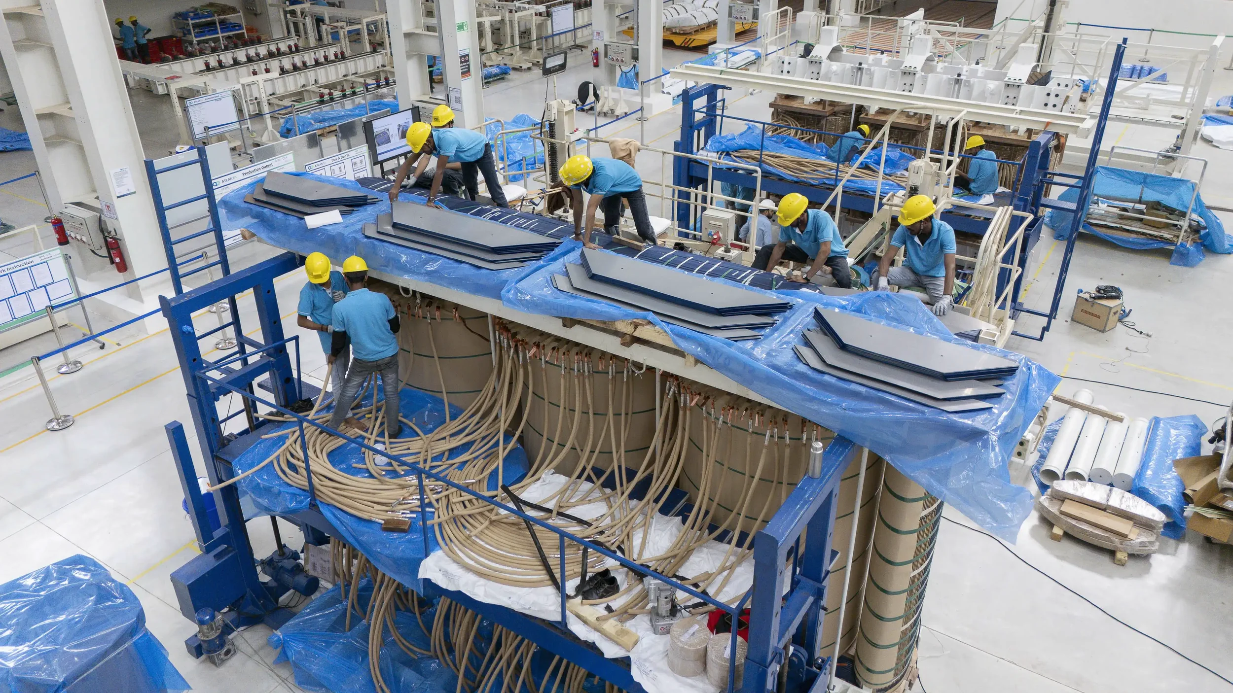 industrial-transformer-winding-manufacturing-team-atlanta-transformers-vadodara-the-industrial-photographer.webp