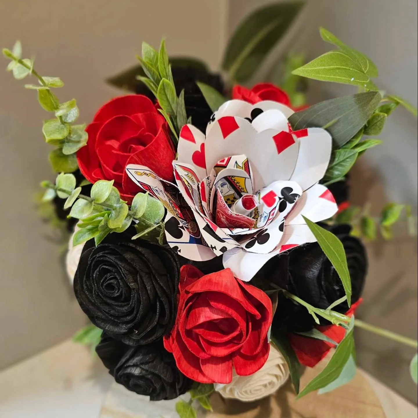 I love creating unique arrangements 🥰

Wood flowers handpainted and paired with a card rose .