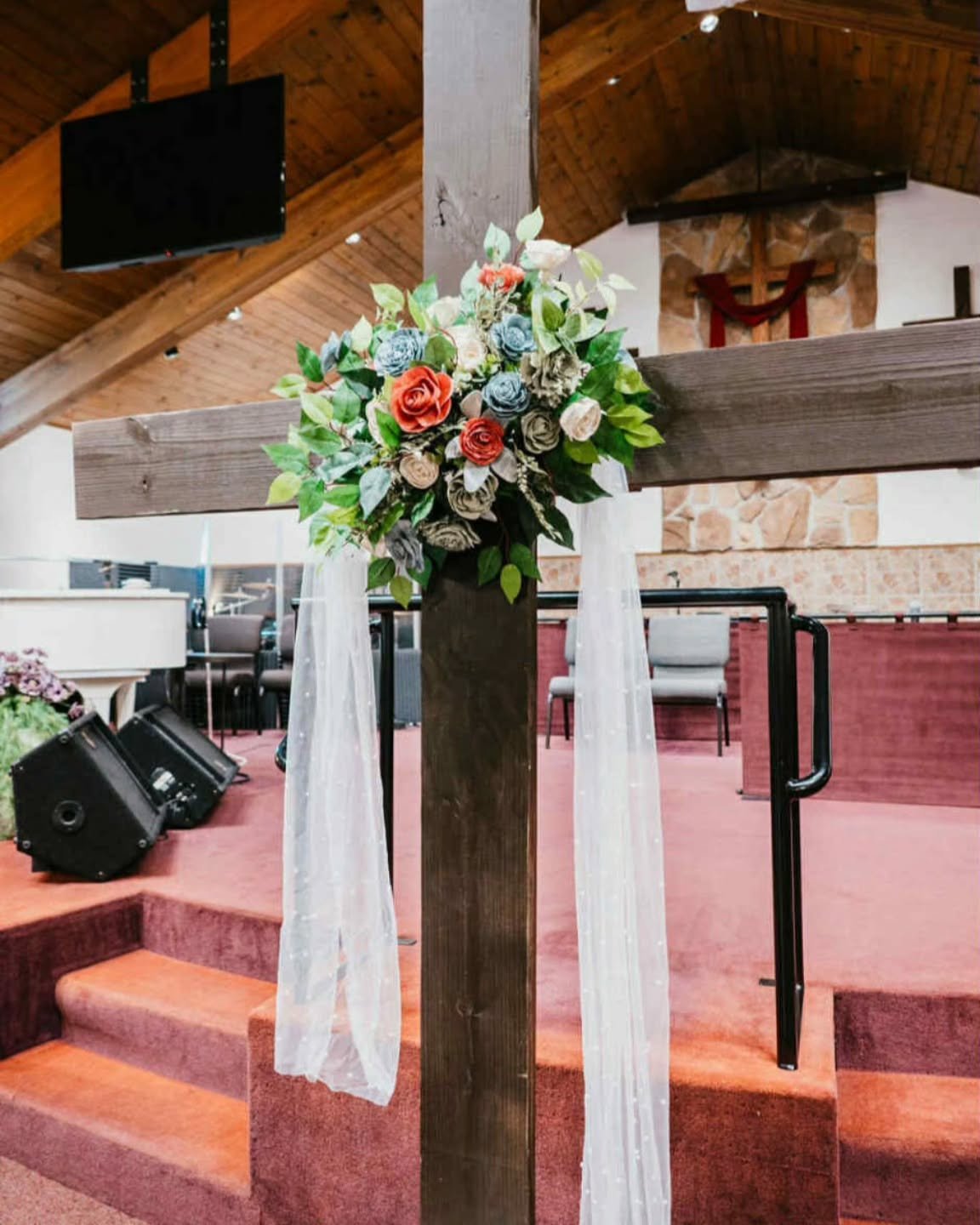 Wood Flowers are perfect for any type of ceremony piece! This Wooden Cross was handmade by the groom for their church ceremony last June. 

Their color story was beautiful. 💜