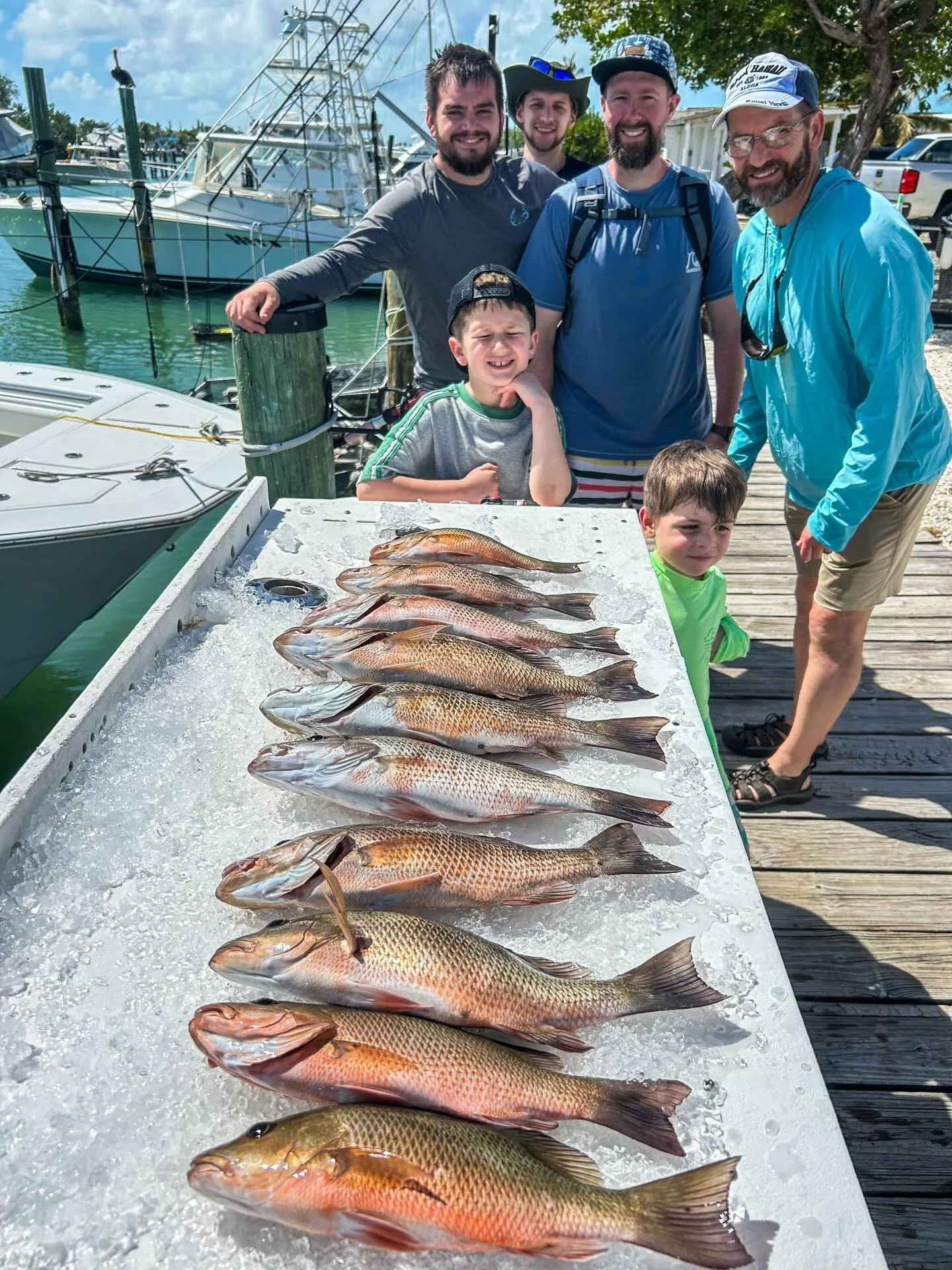 Windy conditions and a dock full of smiles. 🎣 💨 🌪️ 🙌☀️
This father-son&rsquo;s crew showed up ready and the fish did too. A table stacked with snapper, two proud boys front and center, and memories that&rsquo;ll last a whole lot longer than the f