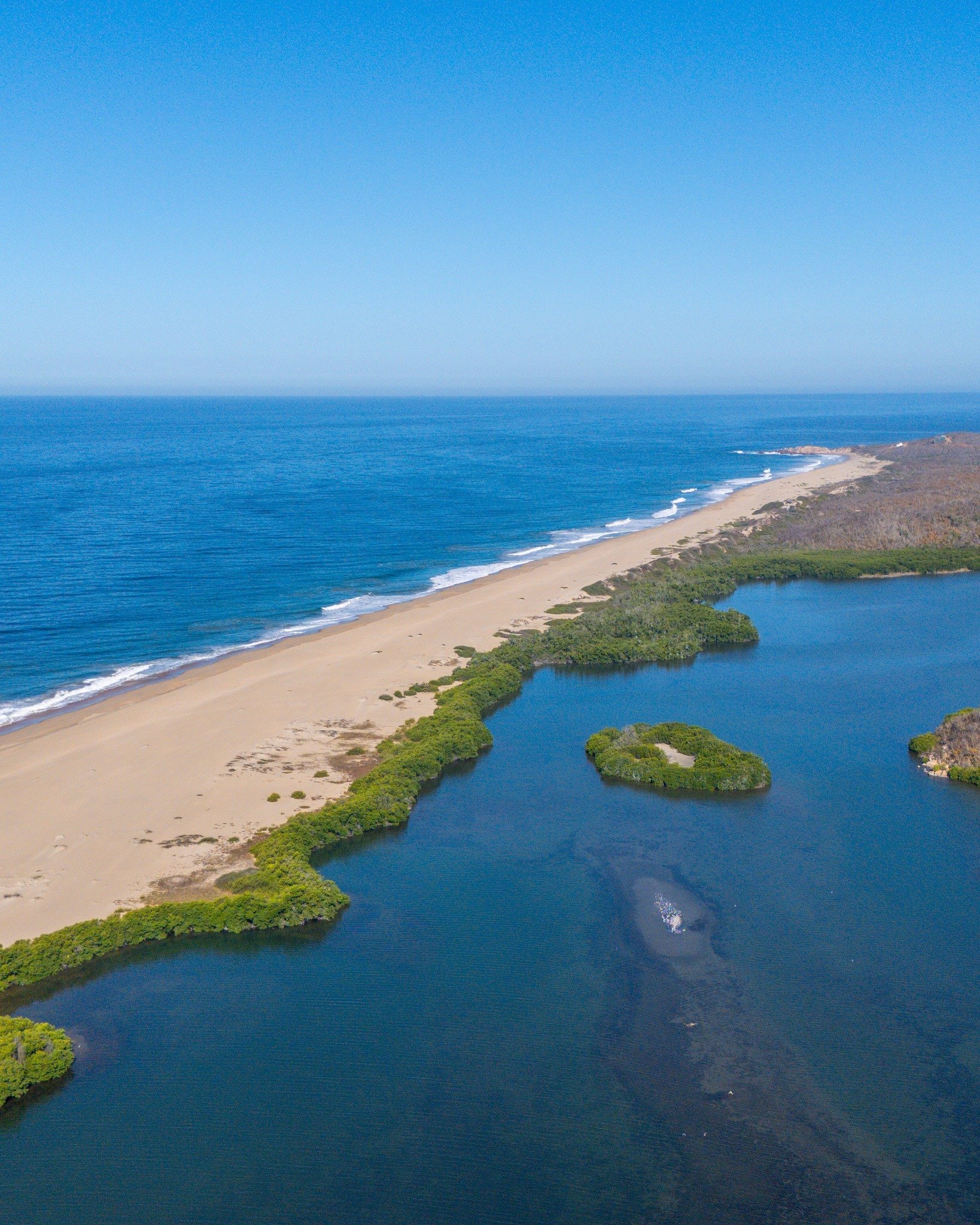 Where mountains cradle pristine shores, something awakens.
Ocean spray meets morning light, lagoons shimmer, the earth's rhythm replaces all else. At The Residences at Chabl&eacute; Costalegre, nature becomes constant&mdash;presence, poetry, peace. E