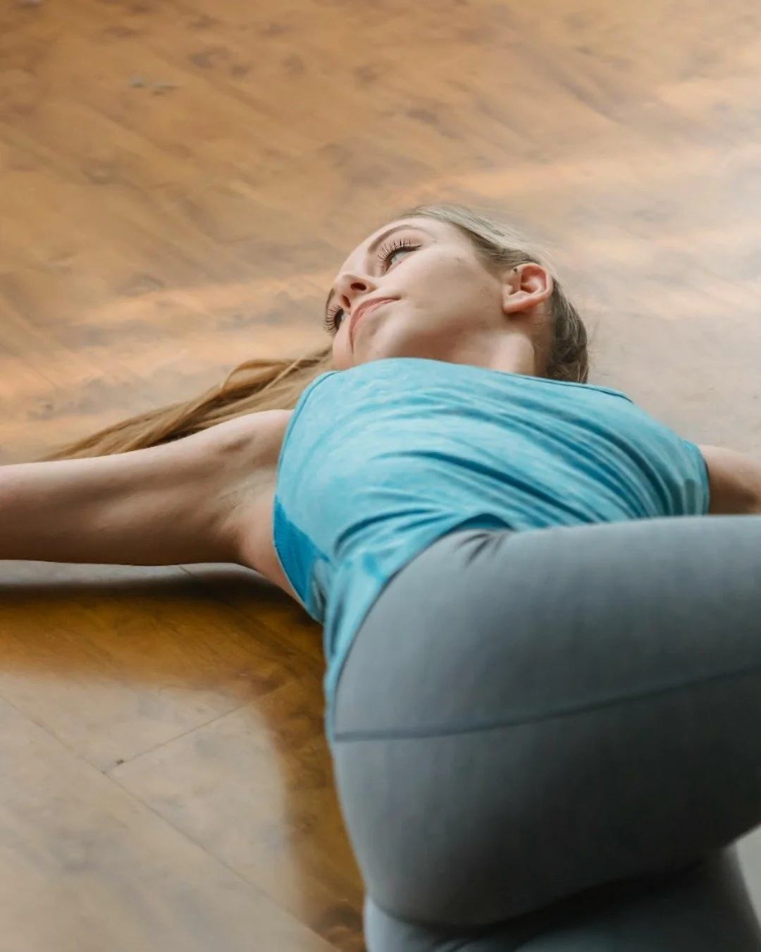 This stretch? It's the supine twist - perfect for spine mobility during National Spine Health Awareness Month! 🦴

Here are some other easy spine stretches to try...

➡️ Cat-cow stretch: On hands and knees, alternate arching your back (cow) and round