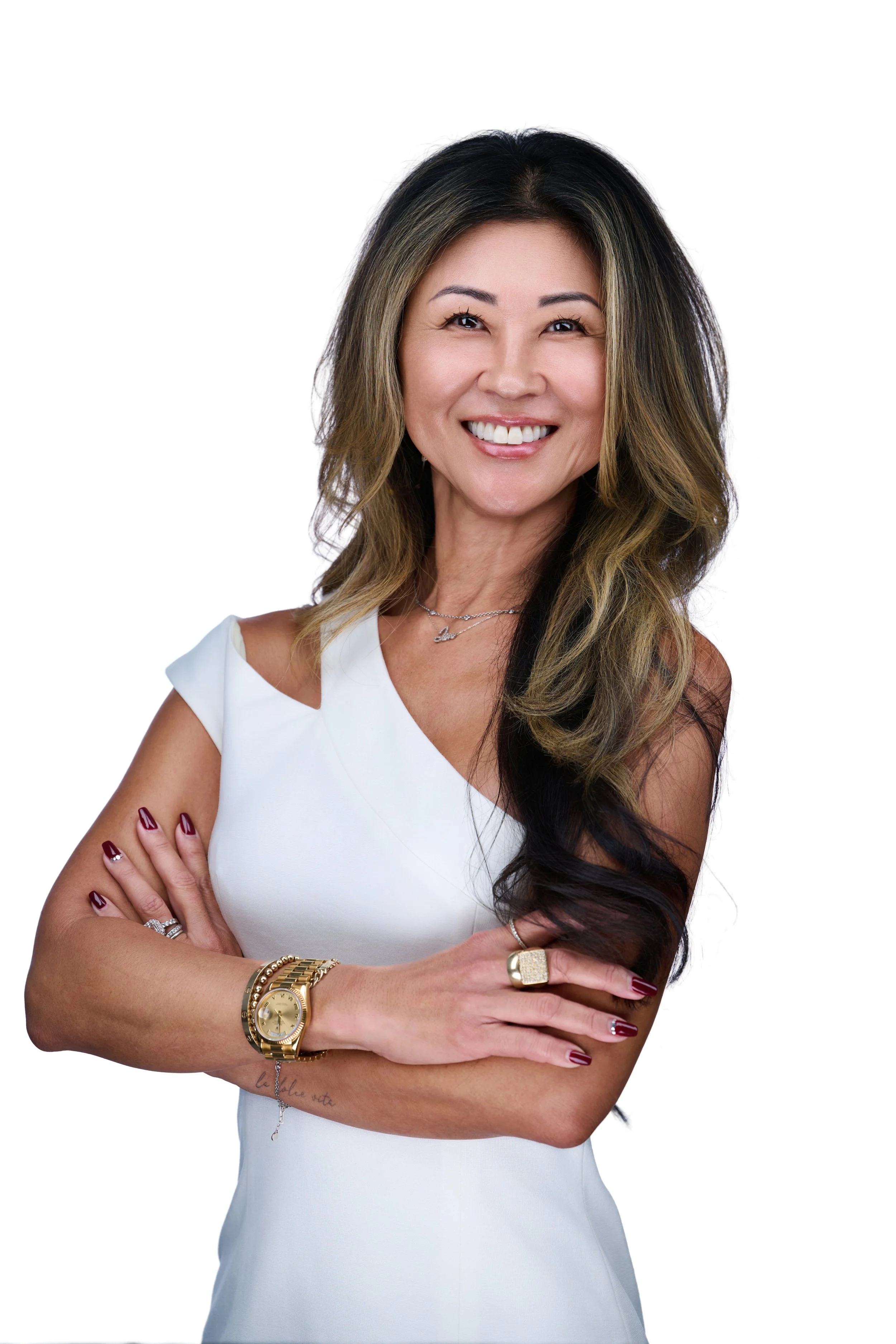 Branding Headshot of a middle aged asian woman in white dress