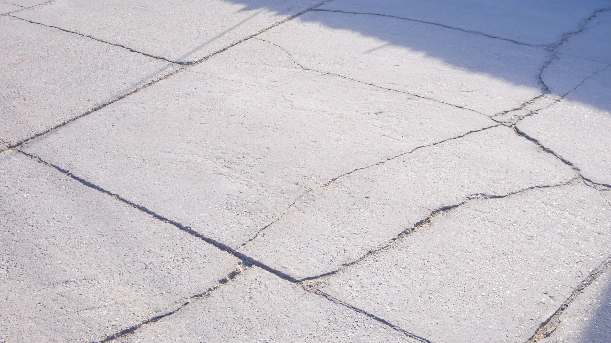 Driveway Edge Cracking: Cosmetic or Structural Problem?