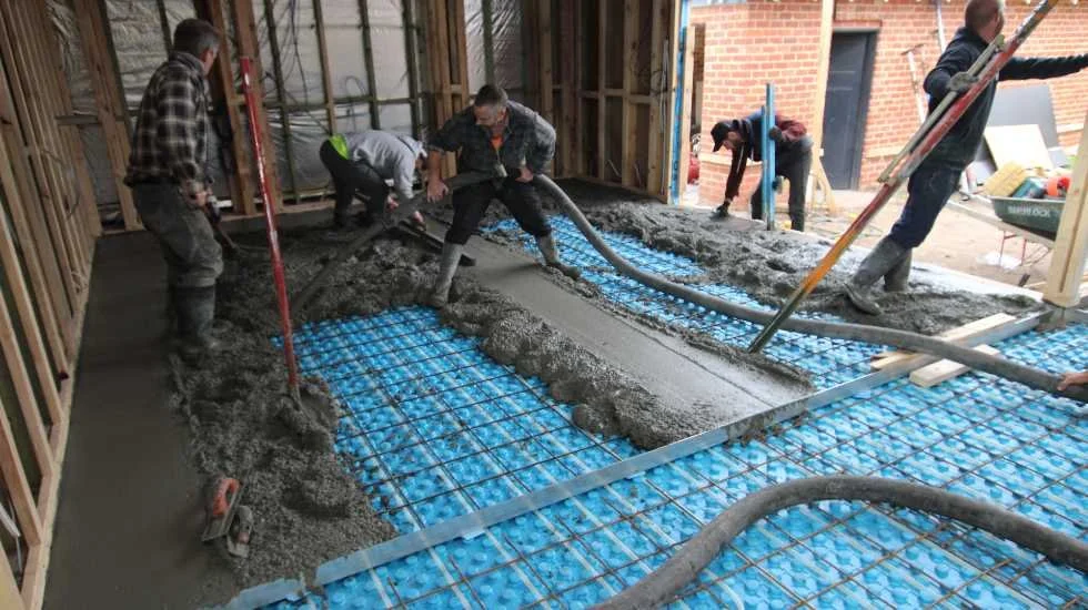 Freshly coated concrete driveway in Edmonton with durable protective surface.