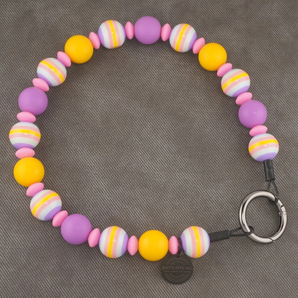 Tropic Like It's Hot! - Stylish beaded dog collars and necklaces in purple and yellow stripes and pastels.