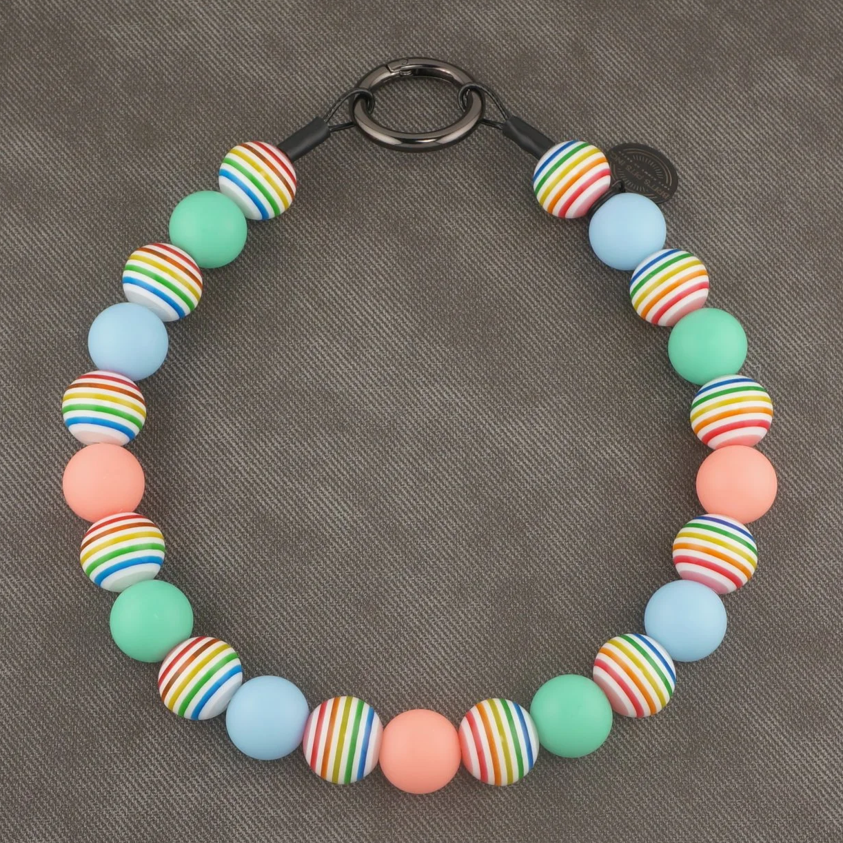 Sandy Paws Social Club - Stylish beaded dog collars and necklaces with teal, light blue, pink, and rainbow stripes.