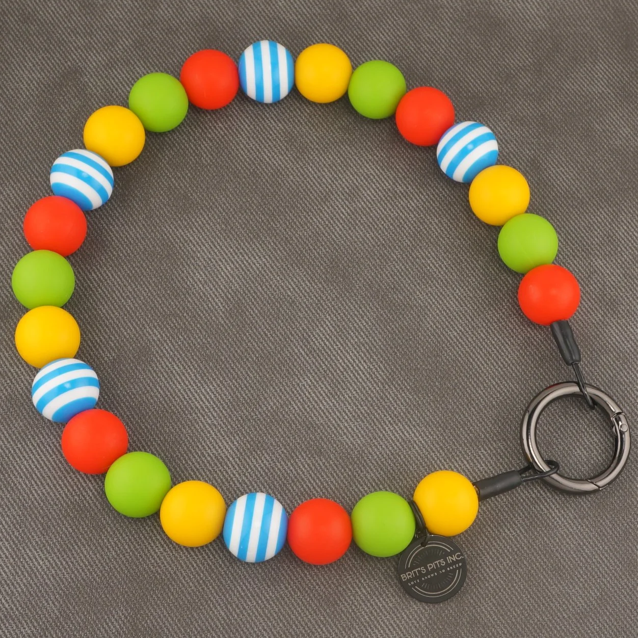Cabana Crush - stylish beaded dog collar or necklace with blue, green, yellow, and blue stripe accents.