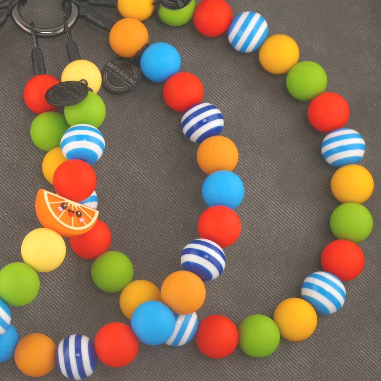 Cabana Crush - stylish beaded dog collar or necklace with blue, green, yellow, and blue stripe accents.