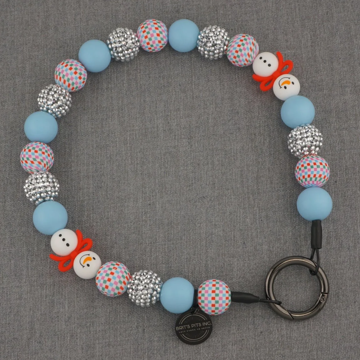 Snowman holiday themed decorative dogs collars and necklaces with checkered and rhinestone beads.