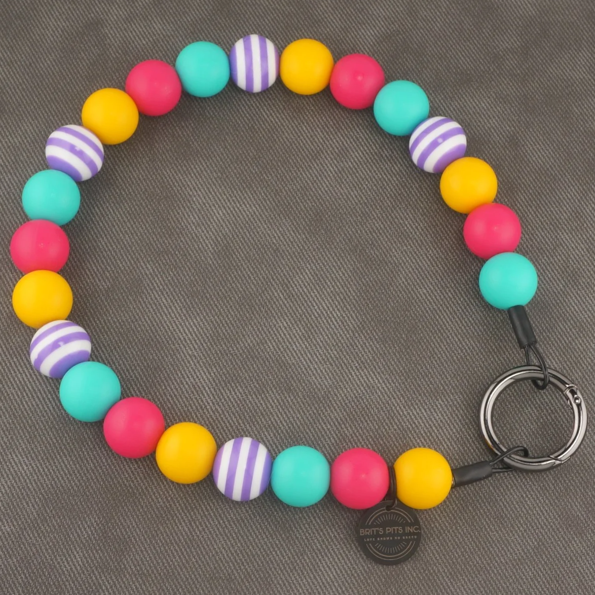 Coastal Chaos - Stylish beaded dog collar and necklace with bright yellow, pink, and blue with purple stripes.