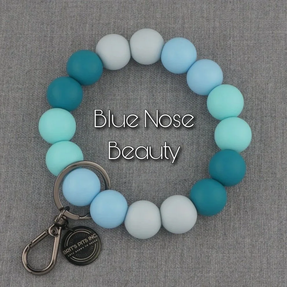 Blue Nose Pitties or Pitbull. Matching wristlet keychain in shades of blue to match your dogs decorative collar or necklace.