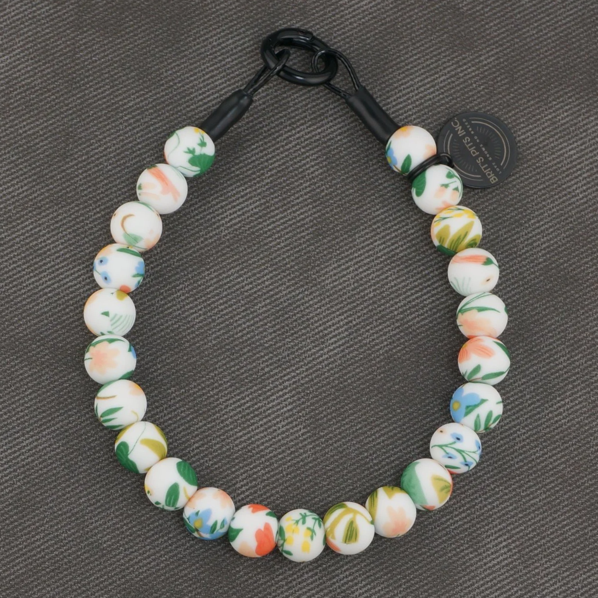 Stylish Custom Dog Collars and Necklaces with floral pattern in blue, pink, green, yellow, red, white