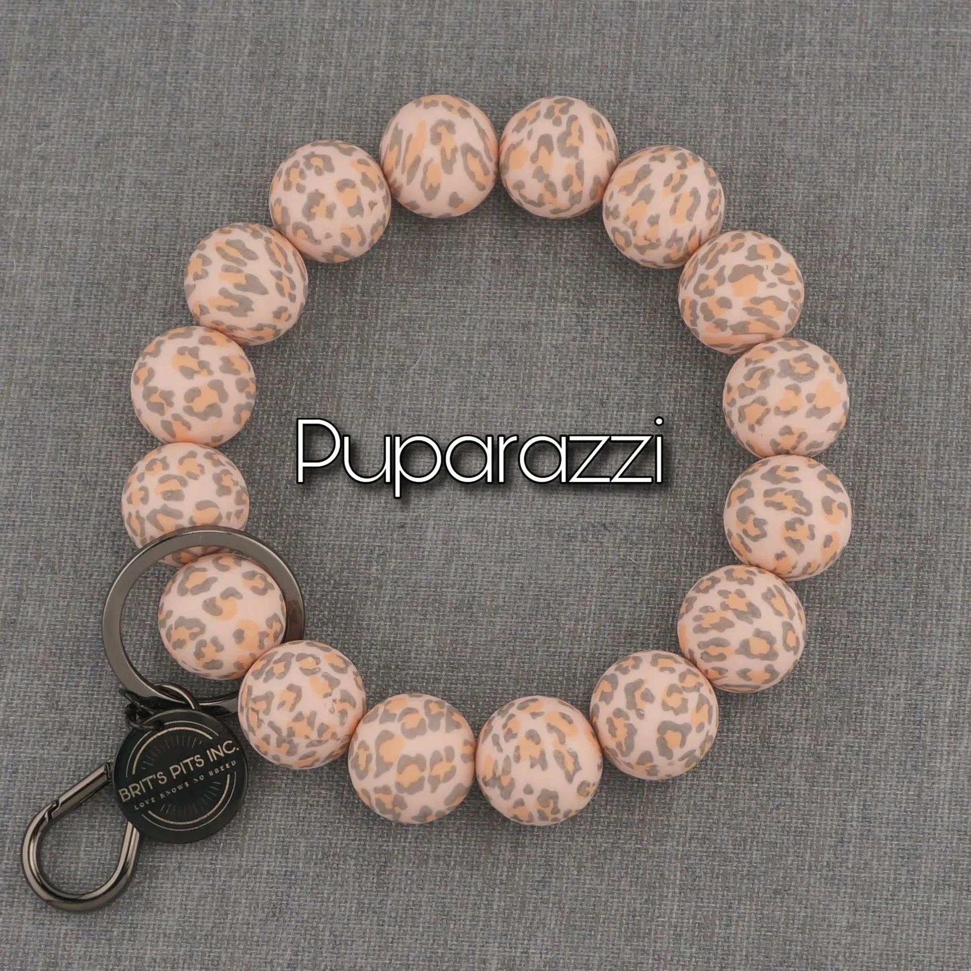 Puparazzi leopard print wristlet keychain with silicone beads.  Match your dog's decorative collar and necklace.
