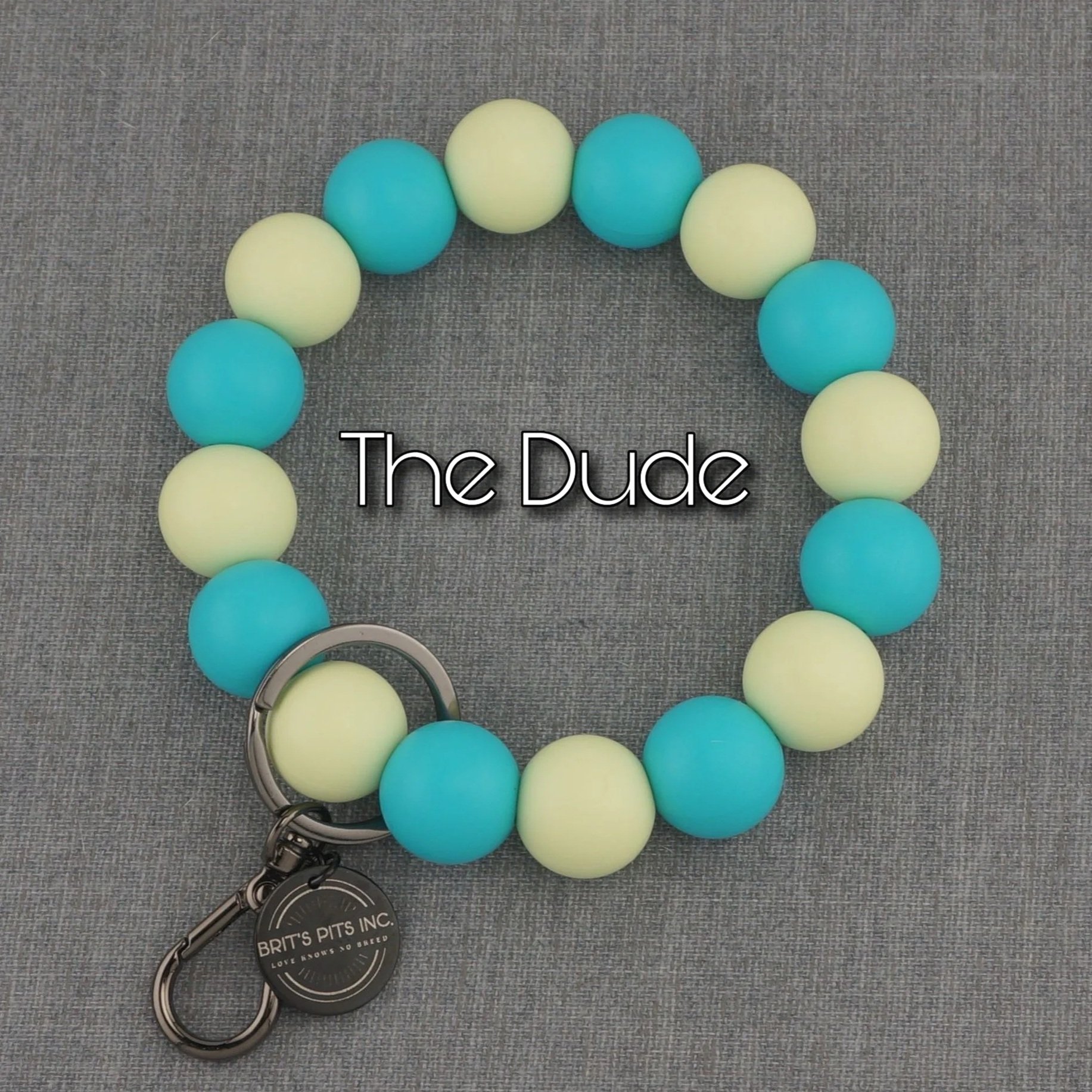 The Dude. Cool blue and yellow for a chill vibe like The Dude! Matching wristlet keychain made with silicone beads.