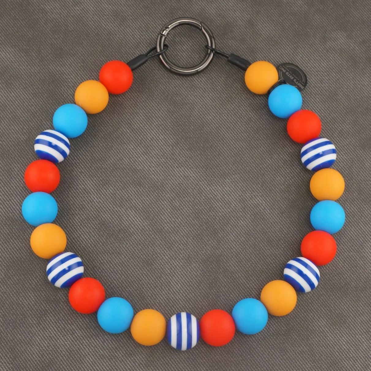 Salty Air & Snackies - Stylish beaded dog collar or necklace with blue, yellow, orange, and blue stripe accents.