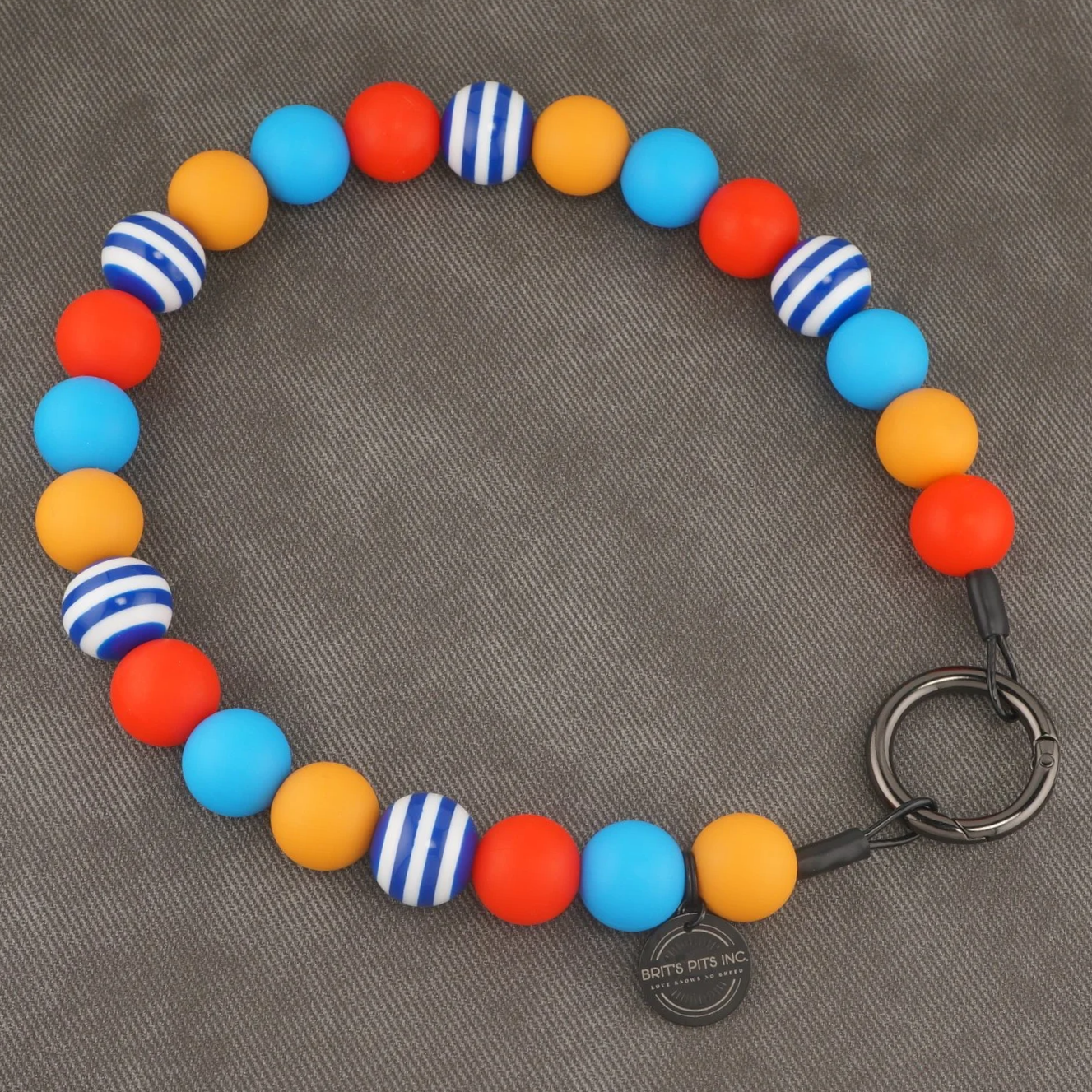 Salty Air & Snackies - Stylish beaded dog collar or necklace with blue, yellow, orange, and blue stripe accents.
