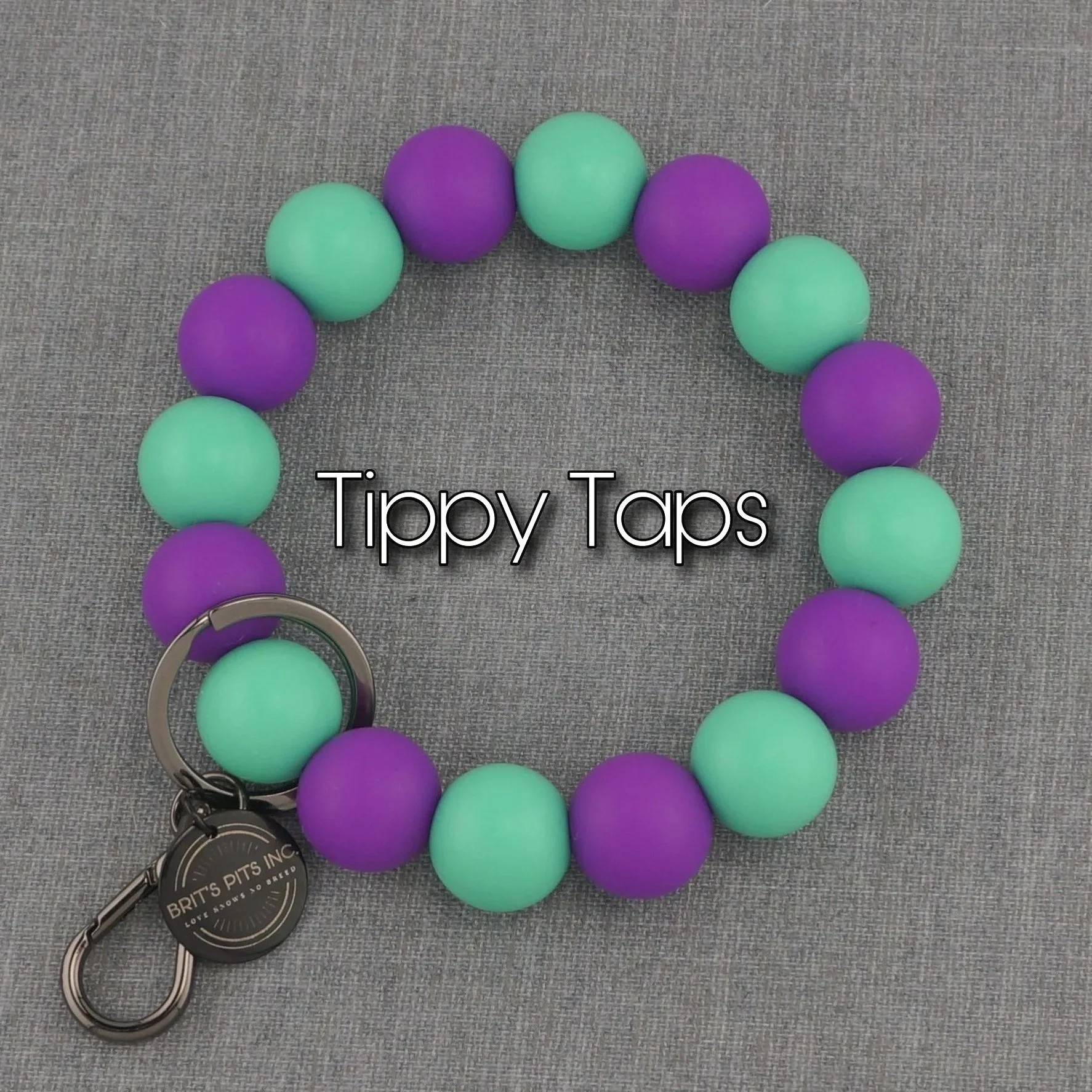 Tippy Taps. Handcrafted custom wristlet keychain to match your dogs decorative collar or necklace.
