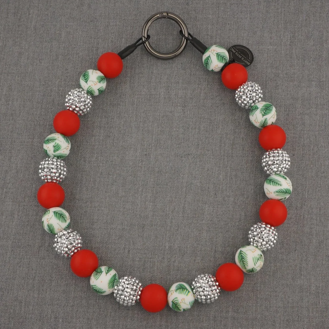 Christmas holiday themed decorative dog collars and necklaces with red, mistletoe, and silver rhinestones that sparkle.