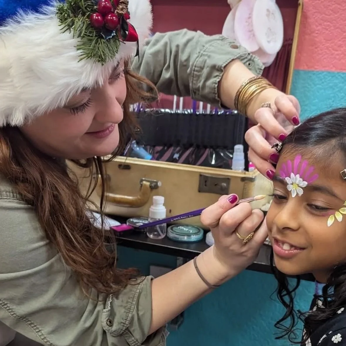 Holiday face painting at @swingsandwings 🥹🎨

This was such a fun event and we even got to see Santa 🎅🏼!!!!!

Book us for your next event or party!
🌈 Face painting 
🪶 Feather hair extensions 
🙌 Sensory play
🫧 Giant bubbles 
💚 Safe + non-toxic
