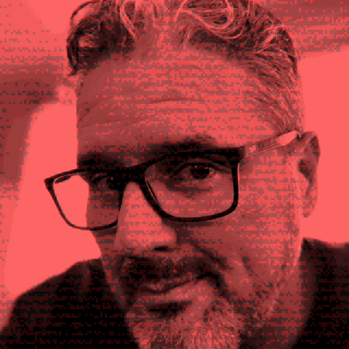 An animated GIF of a self portrait, glitching in a circle.