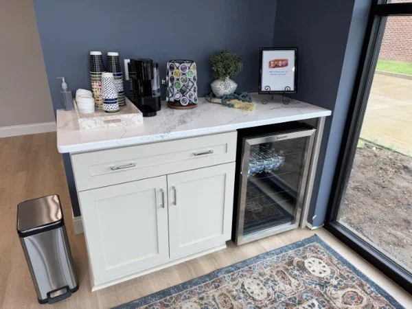 Custom quartz-top casework refreshment station at Advantage Eye Care