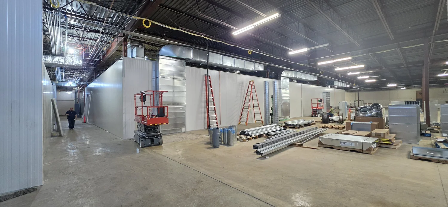 Terrapin Construction Group crew installing insulated metal panel cultivation room walls inside an indoor cannabis cultivation facility in Minneapolis, Minnesota