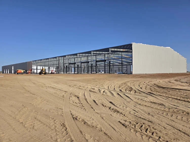 Pre-engineered metal building steel erection on a 300,000 SF data center support campus north of Dallas, Texas, by Terrapin Construction Group