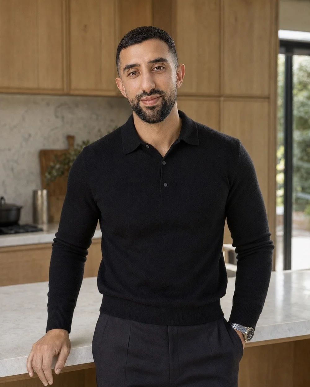 Aaron, owner of Bluestone Build Co, in a completed kitchen