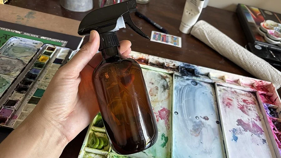 Spray bottle used with watercolor painting.