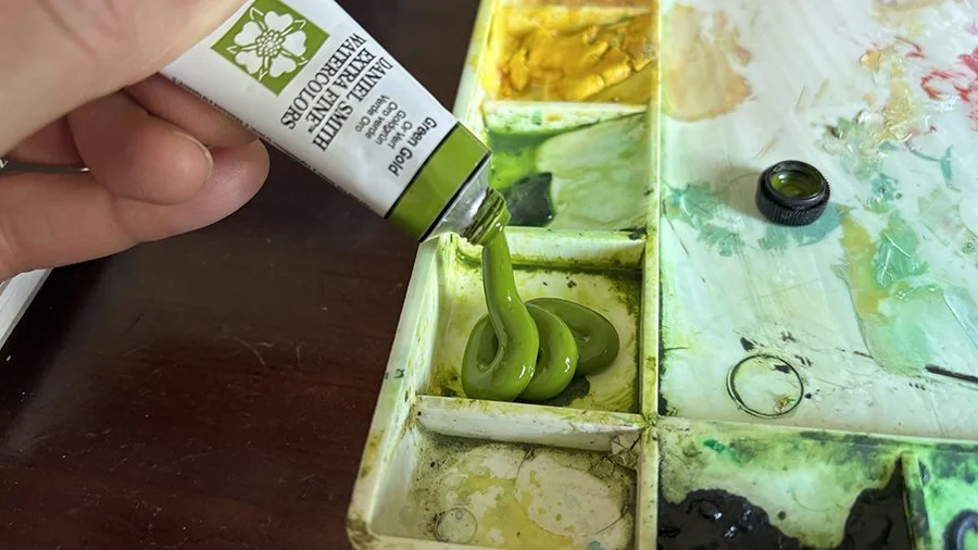 Filling a palette with a paint tube