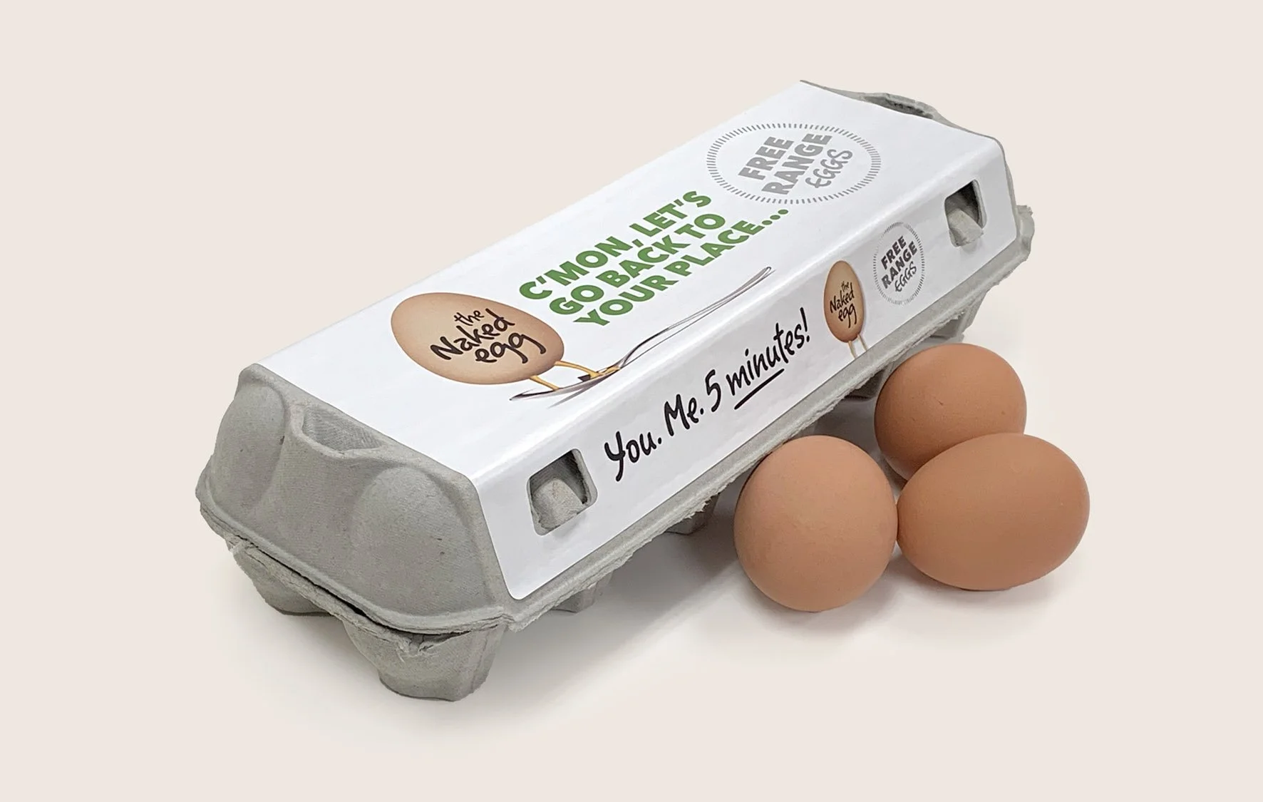 A carton of eggs with a label that reads 'Come on, let's go back to your place...' and 'You. Me. 5 minutes!' alongside small illustrations and logos, with three eggs placed beside the carton.