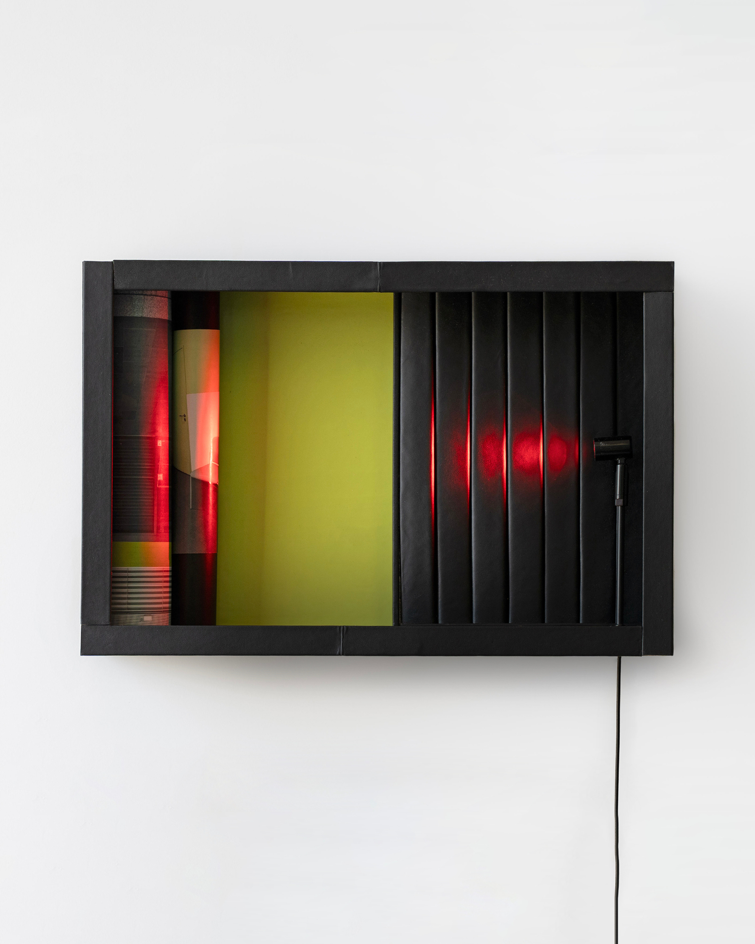 Loucia Carlier 
Le millénaire, 2025 
Wood, fake leather, PVC, inkjet prints, coated fabric, internal light 
30 x 45 cm 
11.81 x 17.22 in. 