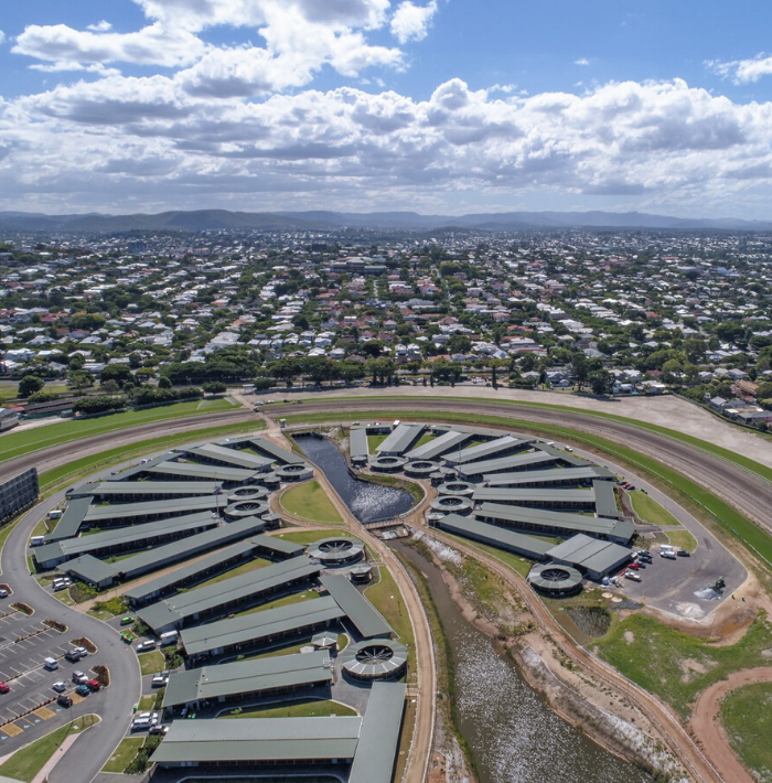 Drone image of Eagle Farm stabling with rows of boxes in the infield of Eagle Farm track