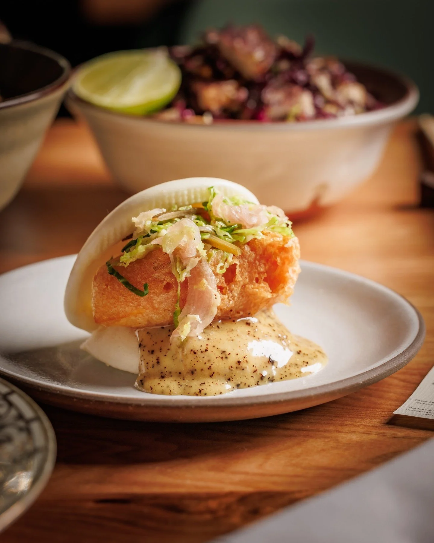 A bao built for sweater weather. Squash tempura with maple, brown butter and brussels sprout slaw.

To try it, you&rsquo;ve got to swing through Tuesday&ndash;Friday between 4&ndash;5 PM. We&rsquo;ll save you a seat at the bar. 😉