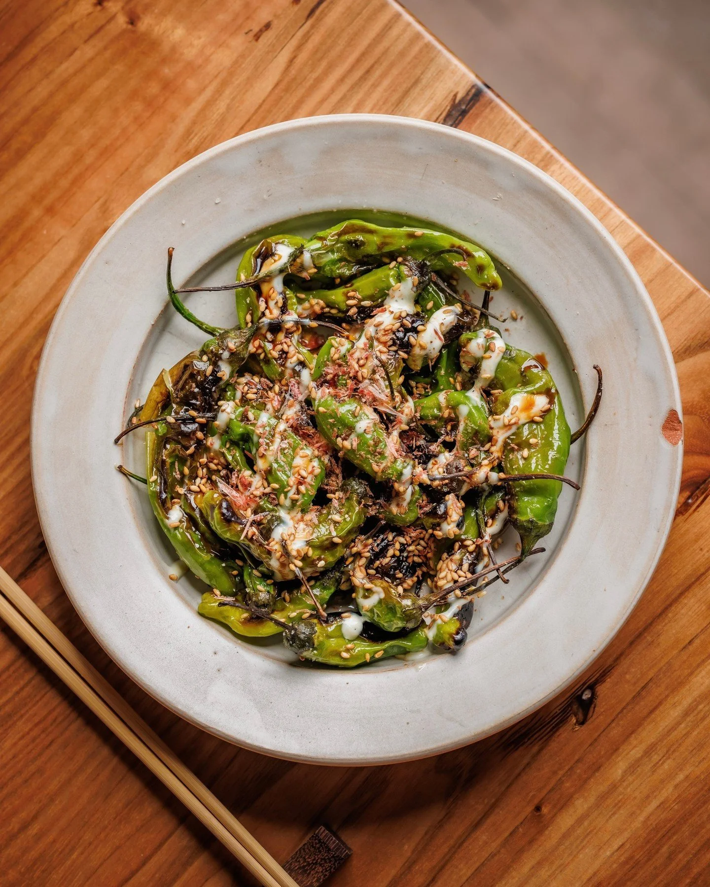 Blistered, saucy, and slightly unpredictable.
Just how we like our happy hour. 😉 

BLISTERED SHISHITO // wasabi labneh, bulldog sauce